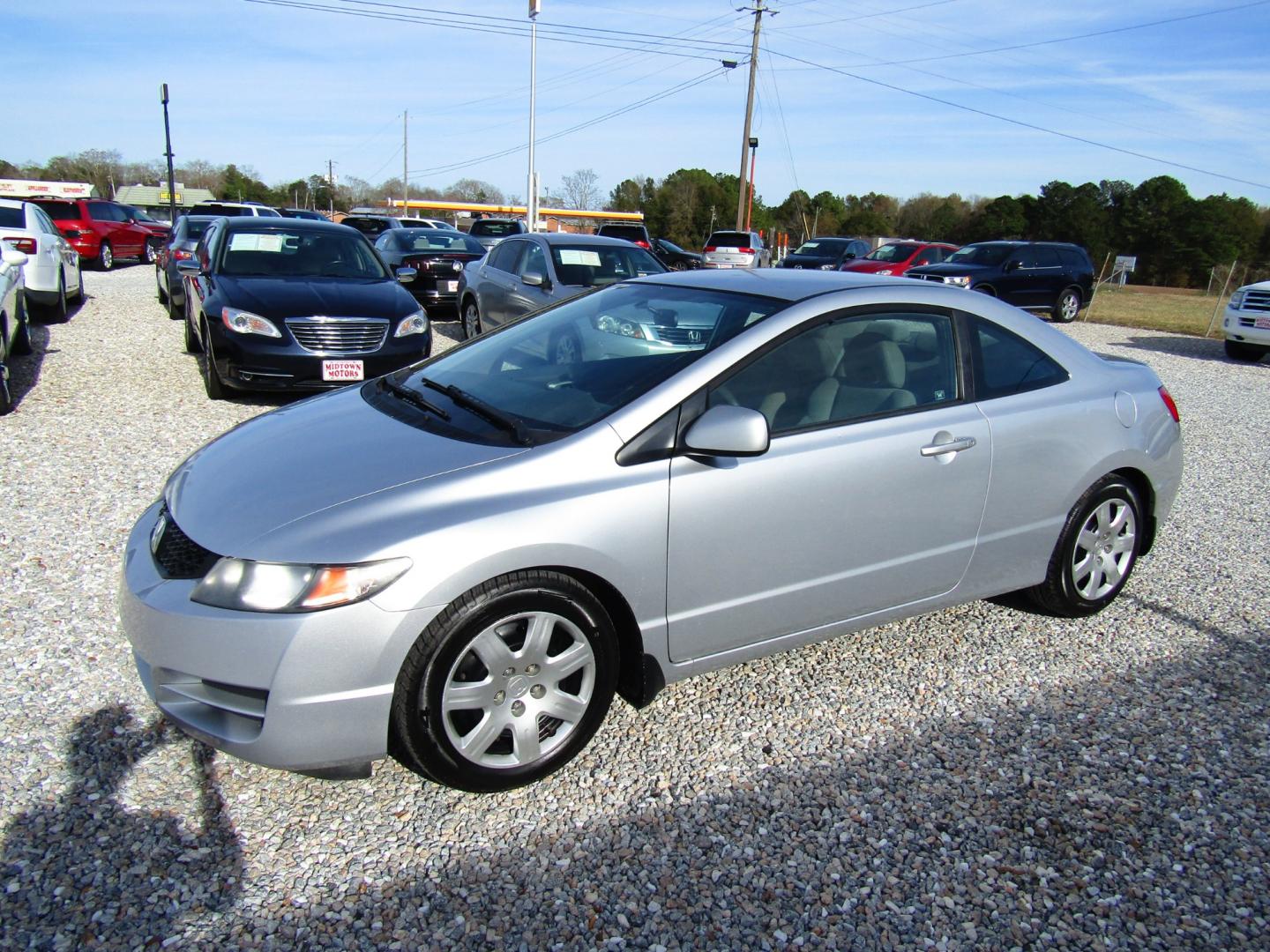 2011 Silver Honda Civic LX Coupe 5-Speed AT (2HGFG1B66BH) with an 1.8L L4 SOHC 16V engine, Automatic transmission, located at 15016 S Hwy 231, Midland City, AL, 36350, (334) 983-3001, 31.306210, -85.495277 - Photo#2